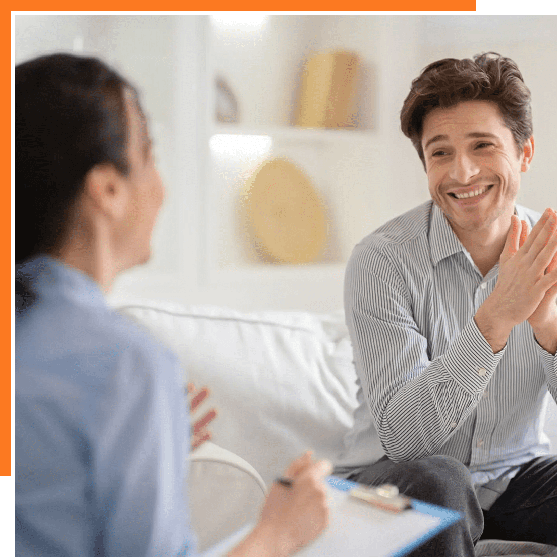 A man talking to a therapist during a counseling session.